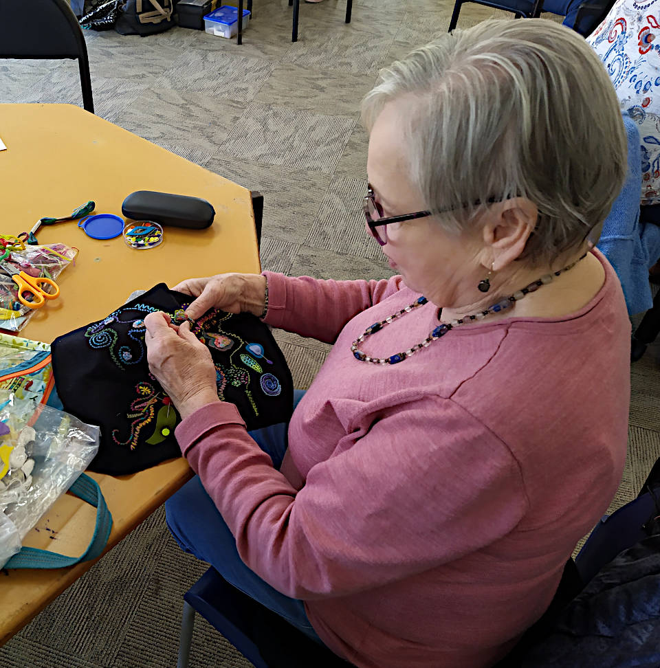 Rosalie doing some fine stitching